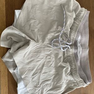 Athleta shorts with bike shorts. Lightly used. Size 2
